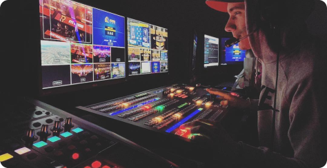 Live broadcast operator working in the control room